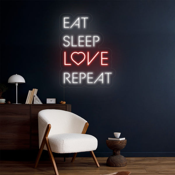 LED neonový nápis 'Eat sleep láska repeat' v obývacím pokoji - Romantický nápis na stěnu pokoje